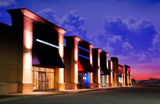 Modern Strip Mall at Night - Royalty-Free Stock Images